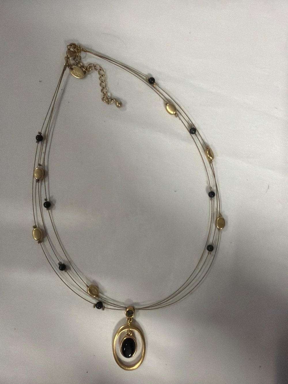 Lia Sophia Elegant Gold and Black Multi-Strand Necklace with Pendant